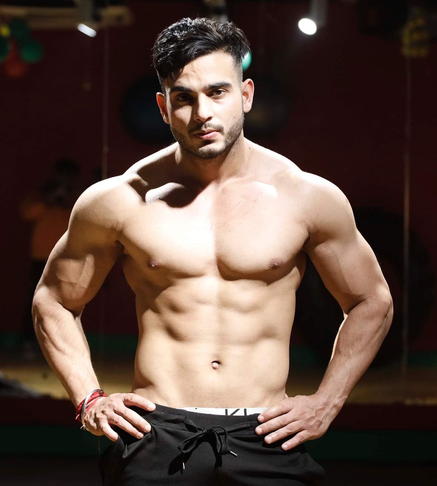 Sumit Kumar, certified personal fitness trainer, in an athletic stance